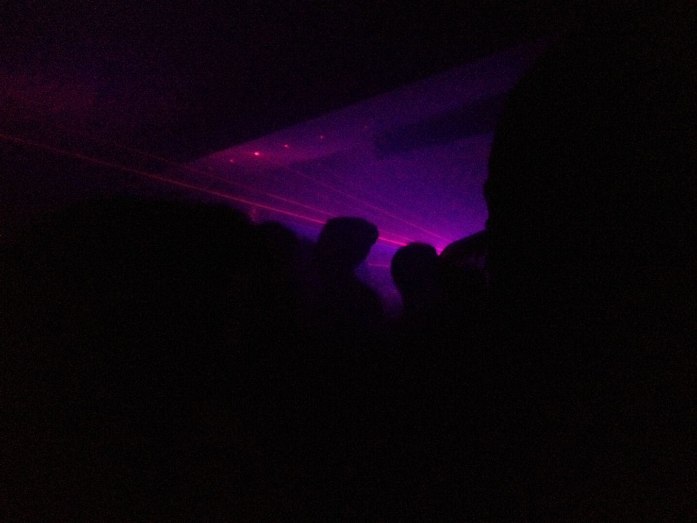 Dark image of people in a nightclub